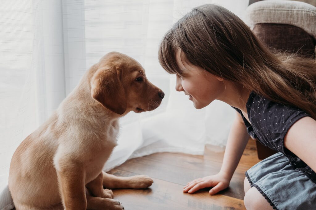 girl with puppy